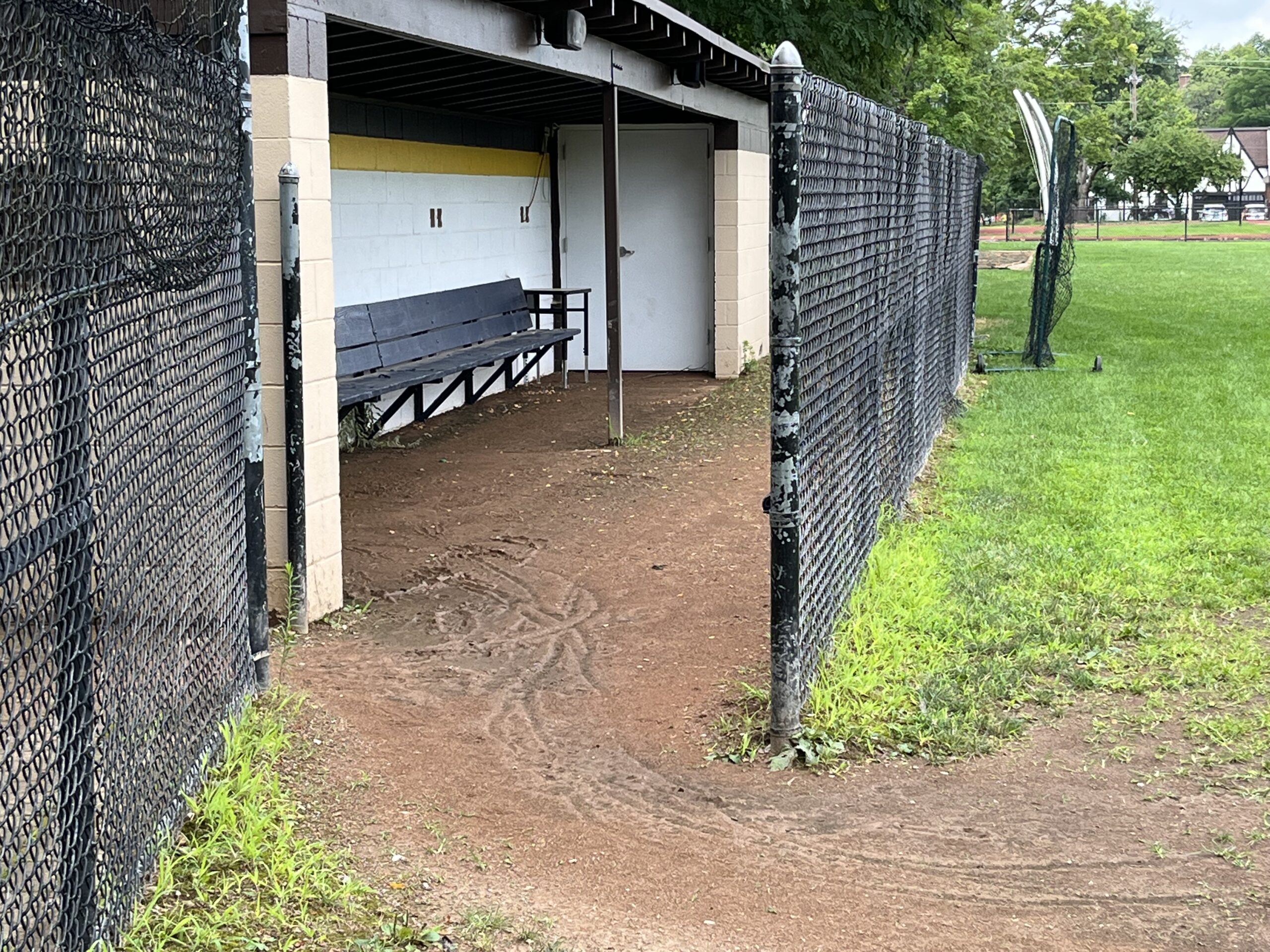 Dugout and batters' warm up area for home team at OHS