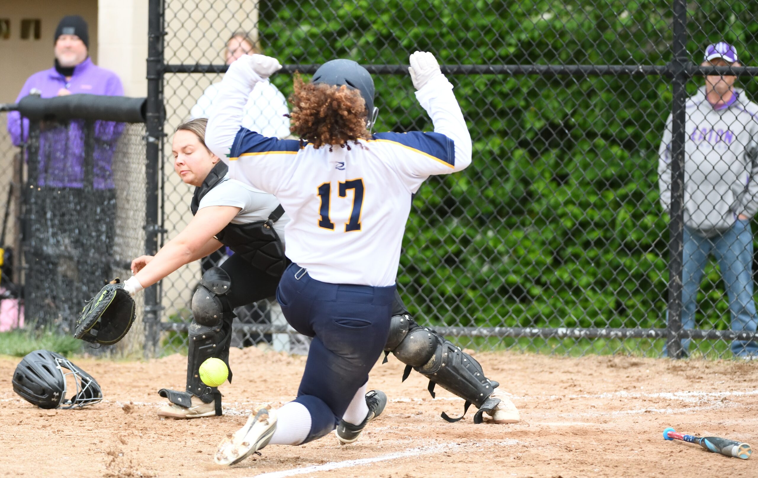 Softball player sliding